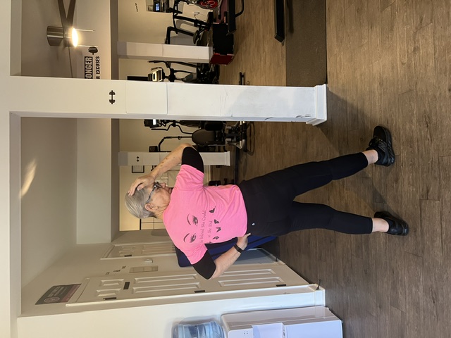 Body Temple VA member showing off her 'I knew she could' shirt